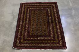 A KHAWAJA ROSHNI BOKHARA WOOL RUG (150 x 116 cm)