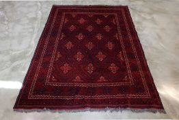 A TURKMAN TRIBAL WOOL CARPET (294 x 200cm)