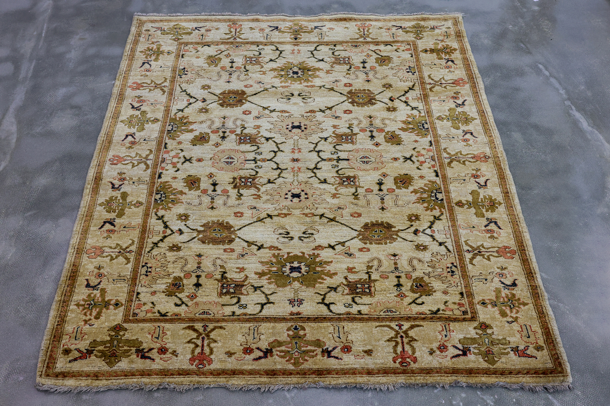 A KERMAN WOOL RUG (205 x 176cm)