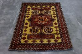 AN AFGHAN KARGHAI WOOL RUG (203 x 150cm)