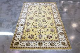 AN INDO KASHMIRI WOOL CARPET (284 x 182cm)