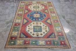 AN ANTIQUE TURKISH WOOL CARPET (315 x 222cm)