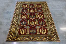 A KAZAK TRIBAL WOOL RUG (257 x 190cm)
