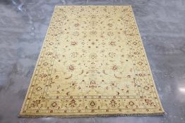 A MASHAD WOOL RUG (270 x 185cm)