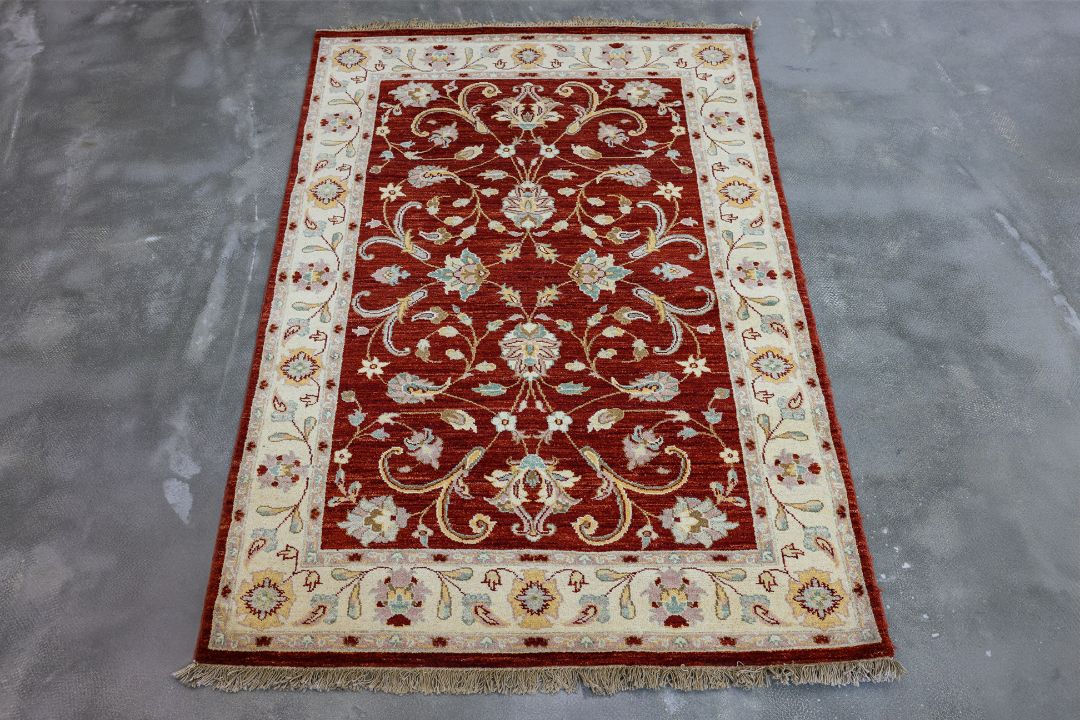 AN AFGHAN REZA WOOL RUG (192 x 125cm) - Image 1 of 3
