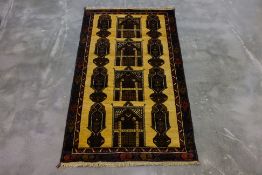 A HATCHLOU TRIBAL WOOL RUG (186 x 103cm)