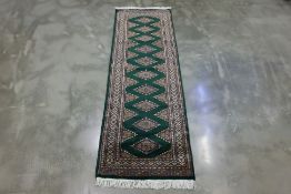 A KASHMIRI SAROUK WOOL RUNNER (242 x 75cm)