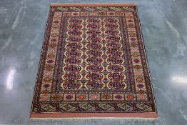 A TURKMEN BOKHARA SILK AND WOOL RUG (167 x 118cm)