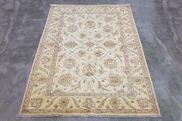 AN AFGHAN WOOL RUG (238 x 167cm)