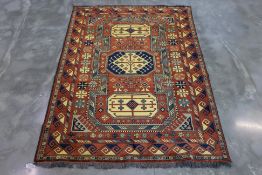 A TURKMEN MIR WOOL RUG (227 x 160cm)
