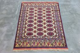 A MASHAD SILK AND WOOL RUG (165 x 116cm)