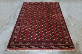 A SUPERFINE TURKMEN BOKHARA WOOL RUG (290 x 208cm)