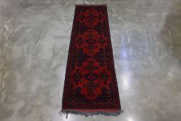 A MAZAR-I-SHARIF WOOL RUNNER (297 x 85cm)