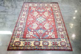 AN AFGHAN WOOL CARPET (284 x 200cm)