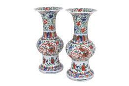 A PAIR OF WUCAI PORCELAIN 'DRAGON' GU VASES