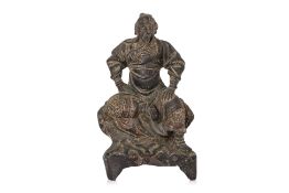 A SEATED BRONZE FIGURE OF GUANDI