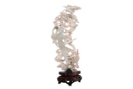 A WHITE JADE CARVING OF A 'XIAN' FAIRY