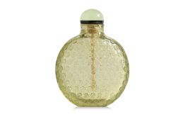 AN OLIVE-GREEN GLASS 'HUNDRED SHOU CHARACTER' SNUFF BOTTLE