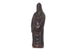 A STANDING BRONZE FIGURE OF A GUANDI