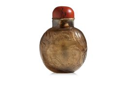A CARVED SMOKY QUARTZ SNUFF BOTTLE