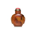 AN AMBER SNUFF BOTTLE