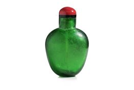 A GREEN GLASS SNUFF BOTTLE