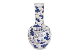 A LARGE UNDERGLAZE BLUE AND COPPER-RED 'DRAGON AND PHOENIX' TIANQIUPING BOTTLE VASE