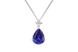 A LARGE TANZANITE AND DIAMOND PENDANT ON CHAIN