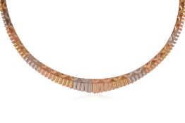 A TRI-COLOUR TEXTURED GOLD NECKLACE