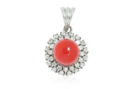 A CORAL BEAD AND DIAMOND PENDANT