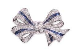 A SAPPHIRE AND DIAMOND 'BOW' BROOCH