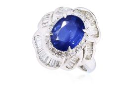 A SAPPHIRE AND DIAMOND RING