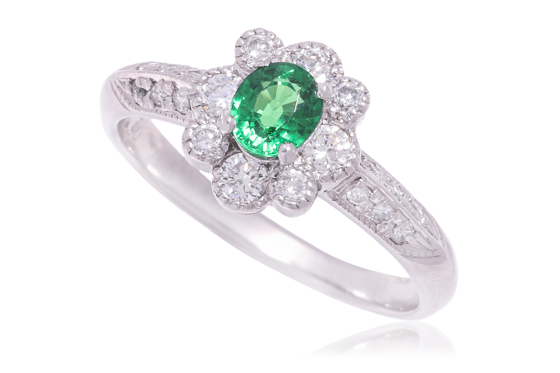 A TSAVORITE GARNET AND DIAMOND RING