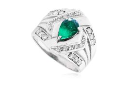 AN EMERALD AND DIAMOND RING