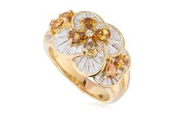 A COLOURLESS AND FANCY COLOUR DIAMOND RING
