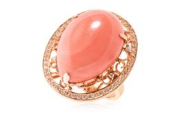 A CORAL AND DIAMOND RING