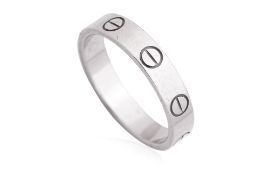 A WHITE GOLD 'LOVE' BAND RING BY CARTIER