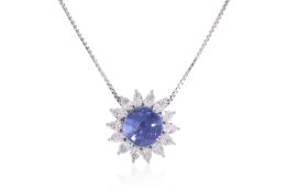 A STAR SAPPHIRE AND DIAMOND PENDANT ON CHAIN