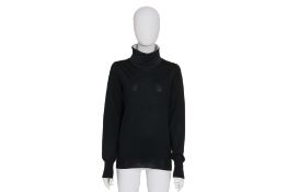 LOUIS VUITTON - A BLACK WOOL SWEATER AND GEOMETRIC PRINT TOP