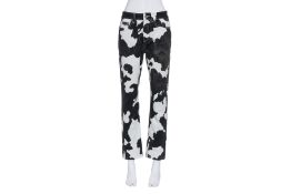 BURBERRY - A PAIR OF COW-PRINT JEANS