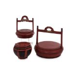 A GROUP OF THREE RED LACQUERED ITEMS
