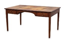 A LEATHER TOPPED MAHOGANY WRITING TABLE