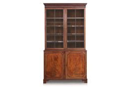 A GEORGE III GLAZED MAHOGANY BOOKCASE