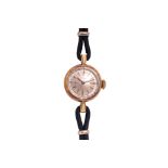 A LONGINES LADIES GOLD COCKTAIL WATCH