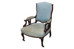 A LATE VICTORIAN MAHOGANY OPEN ARMCHAIR