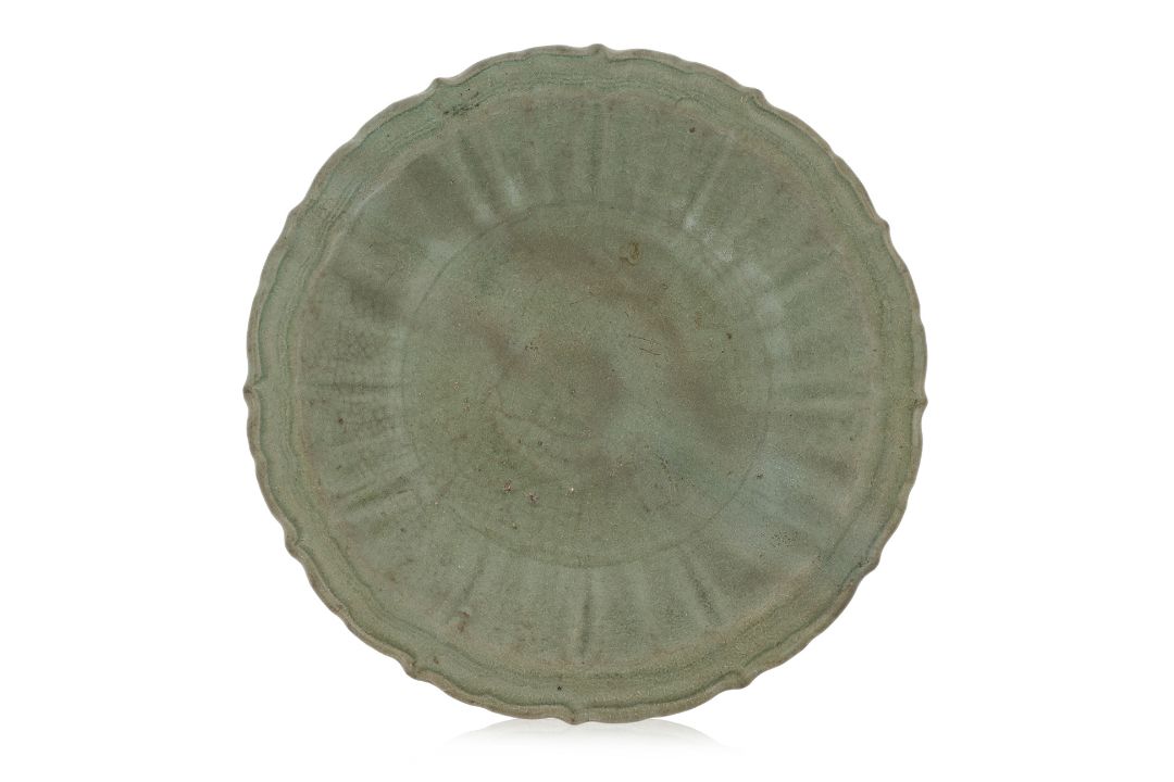 A LARGE CELADON DISH - Image 1 of 3