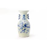 A BLUE AND WHITE TWIN HANDLED PORCELAIN VASE
