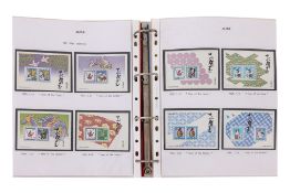 AN ALBUM OF MINT WORLD STAMP SETS, I-R