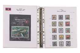 AN ALBUM OF LAOS MINT & CTO STAMP SETS, 1958-2002