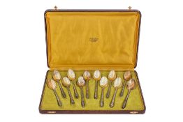 A SET OF 12 FRENCH SILVER GILT TEA SPOONS